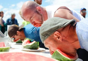 Kevin Pennyfeather Rep Staff (L-r) Finalists Jon Dennis, Jerome Caouette and Sean McGillis competed in the dads-only hands-free watermellon eating contest at the Daystar Church Father’s Day Bash on June 18.